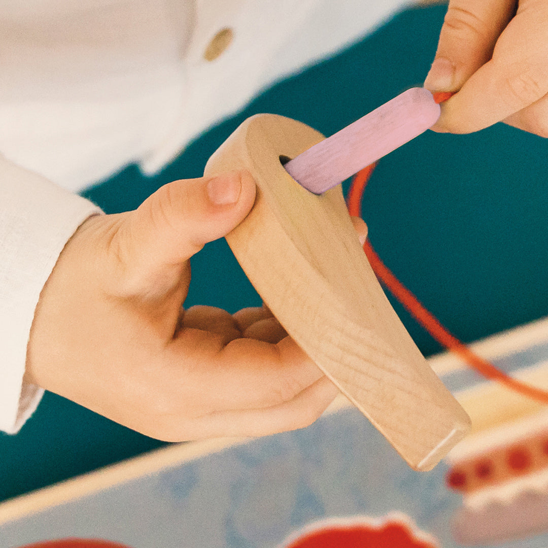 Puzzle à enfiler "Petit ver adore manger"